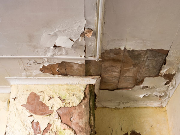 Ceiling damaged by water leak at property in Manchester